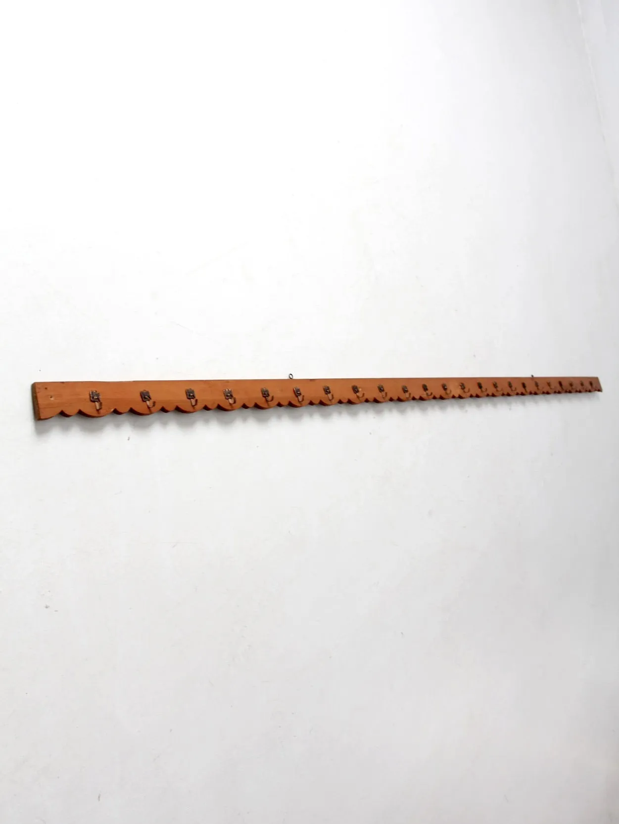 vintage handmade wall rack with eagle hooks