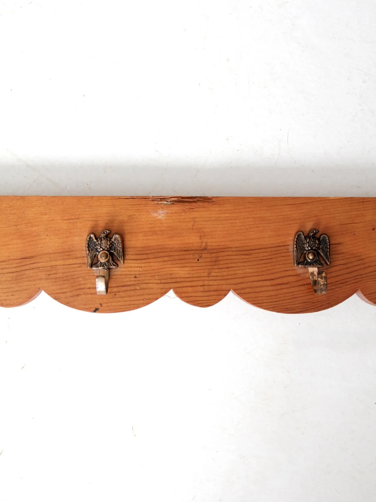 vintage handmade wall rack with eagle hooks