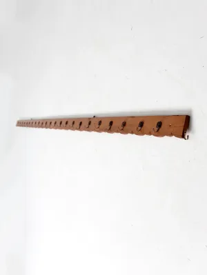 vintage handmade wall rack with eagle hooks
