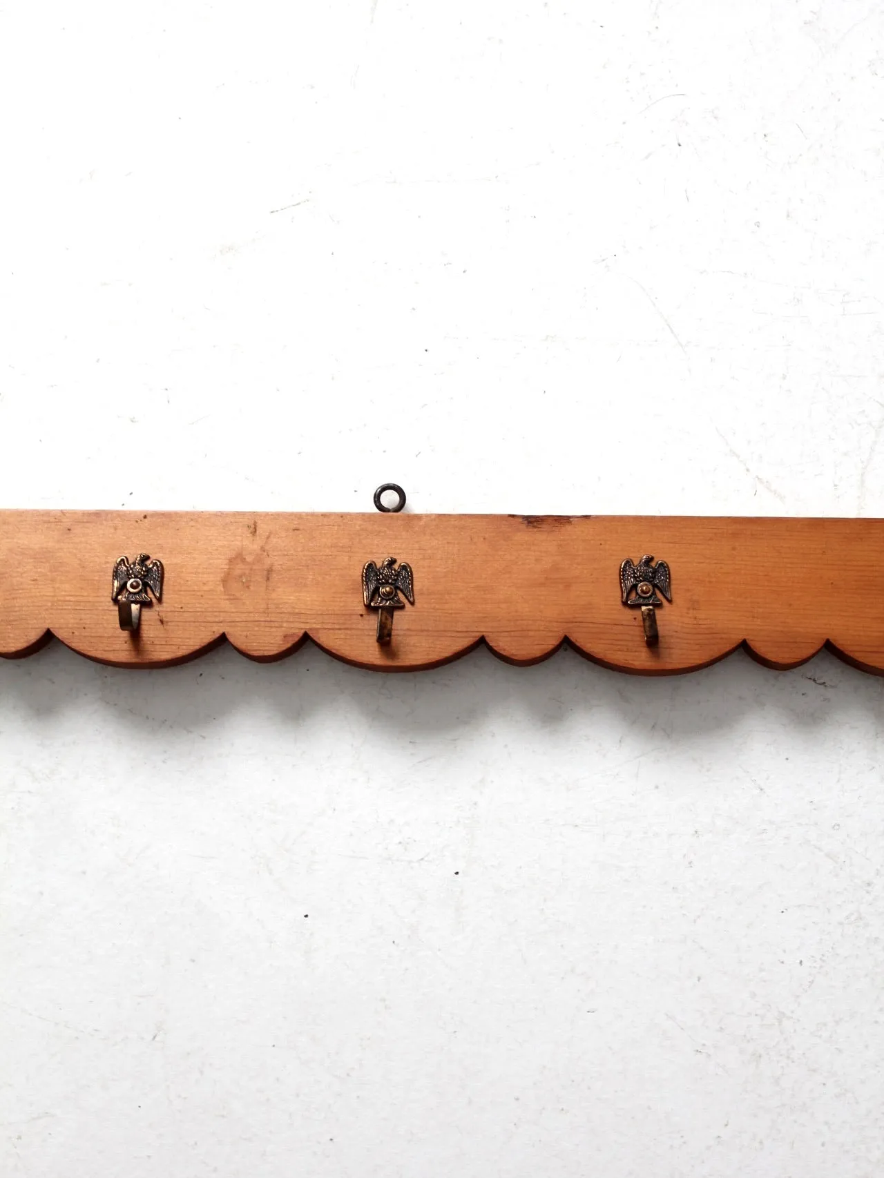 vintage handmade wall rack with eagle hooks